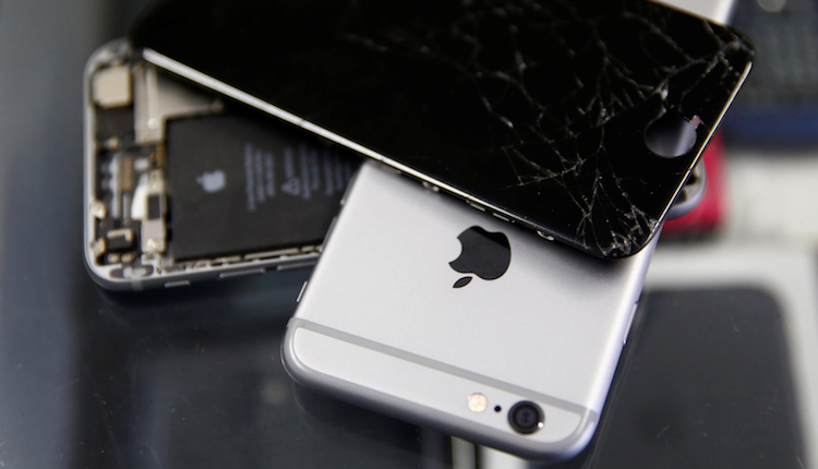 Broken Apple iPhones are seen in a repair shop in Vienna